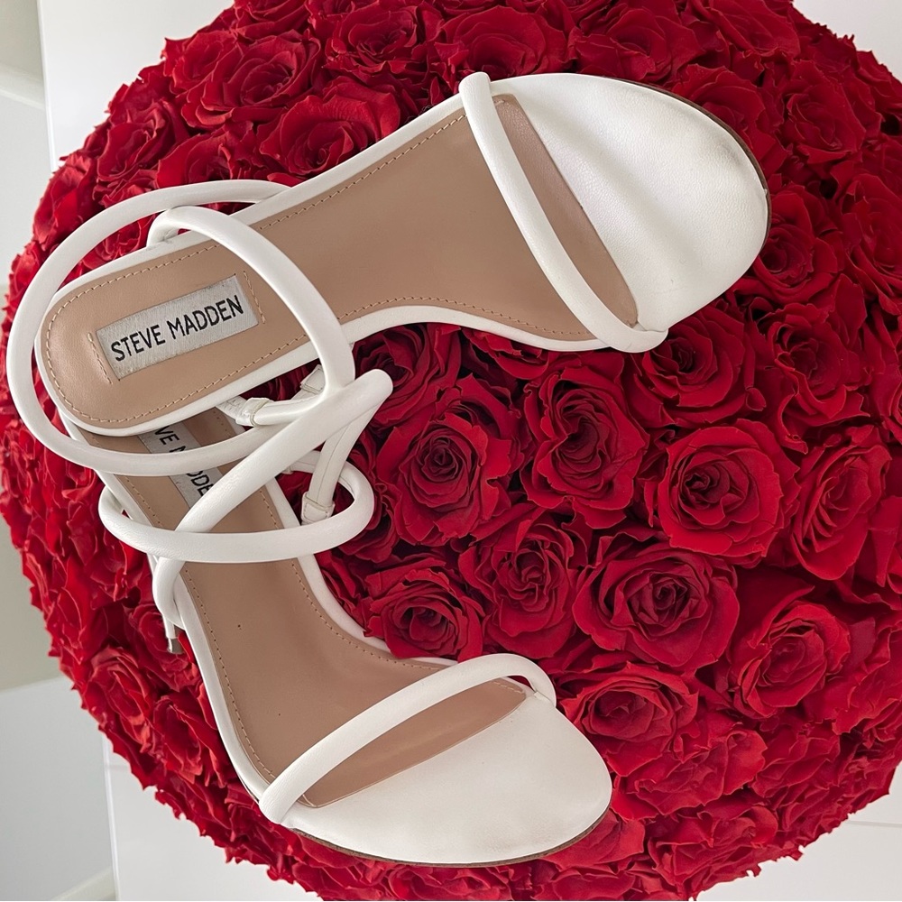 Steve Madden white high heel sandal.